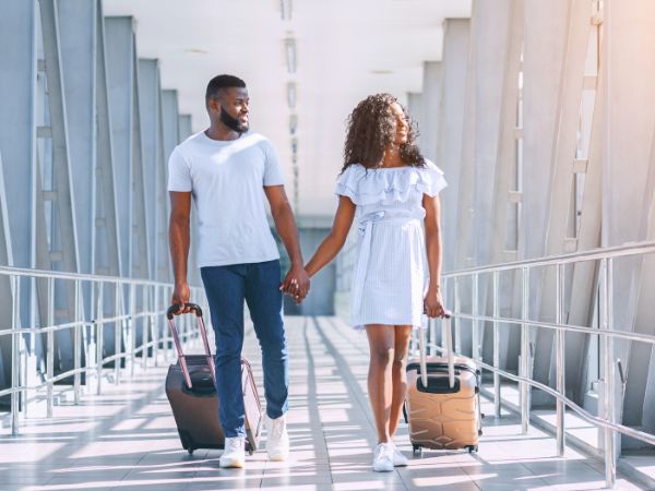 Couple walking in the Airport